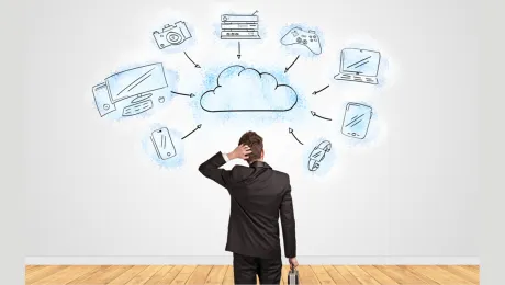 Man standing before cloud migration plan