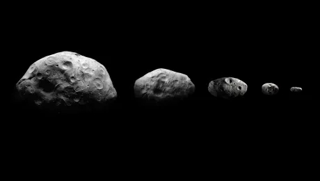 Different sized rocks on a black background